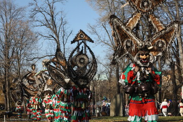 The Surva masquerade games festival in Sofia, Bulgaria. People called Kukeri parade in masks and ritual costumes, perform ritual dances to drive away evil spirits in Sofia, Bulgaria