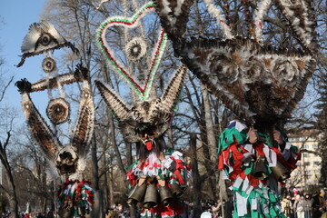 The Surva masquerade games festival in Sofia, Bulgaria. People called Kukeri parade in masks and ritual costumes, perform ritual dances to drive away evil spirits in Sofia, Bulgaria