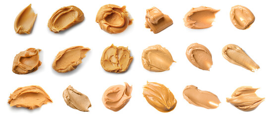 Obraz premium Many strokes of peanut butter on white background, top view