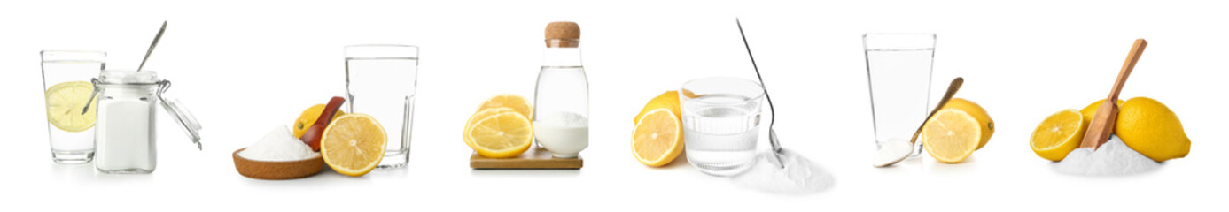 Set of baking soda, vinegar and lemons on white background