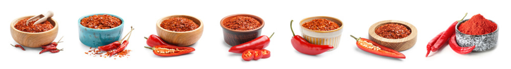 Set of bowls with chipotle chili flakes and powder on white background