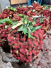 basket of fresh rambutan fruit