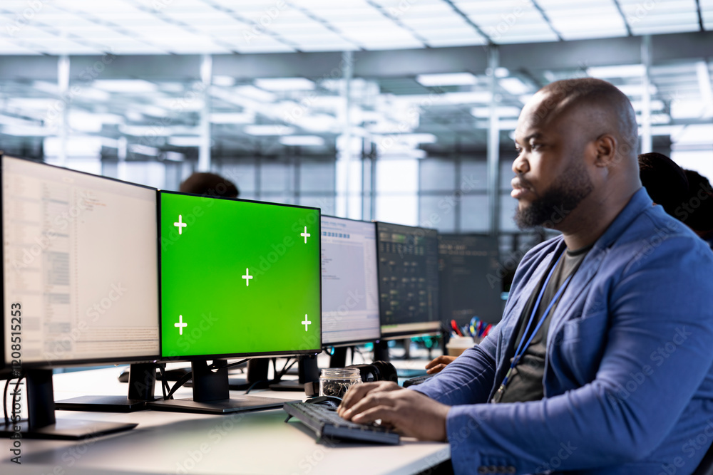Poster software developer in data center using diagnostic tools on green screen pc to identify root cause o