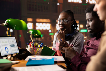 University students learning accounting principles and financial analysis for their business administration courses, leveraging textbooks and digital tools in the campus library. Entrepreneurship.