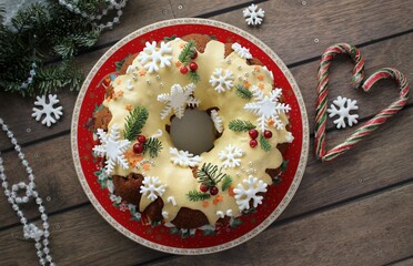 Christmas cupcake. Homemade cakes. A treat. Sweet dessert. Food. Delicious cupcake with nuts and dried fruits. Beautiful festive background. Bakery. Cosiness. Happy New Year. Raisins and dried apricot