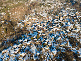 Aerial Winter Sunset view of Village of Kovachevitsa, Bulgaria
