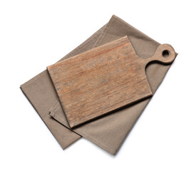 Wooden cutting board and grey napkin on white background