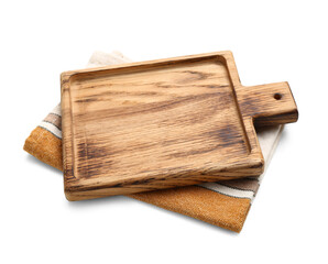 Wooden cutting board and napkin on white background