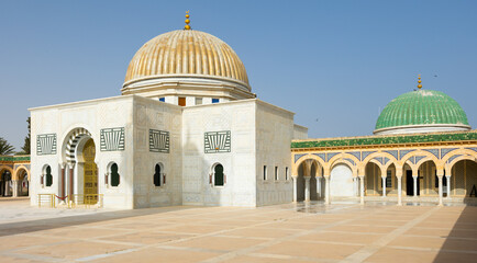 Scenic view of Habib Bourguiba Mausoleum in Tunisian city of Monastir with green and gold domes and...