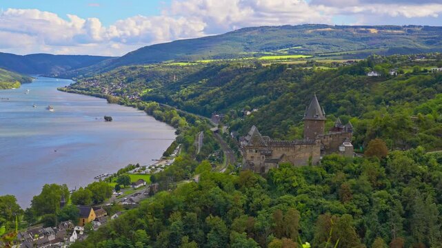 Aerial panoramic view of the Stahleck Castle and the small town of Bacharach on the banks of the Rhine River, Rhine Valley, Germany
