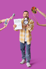Young man shouting into megaphone and female hands with items on violet background. Artist as Outlaw Day