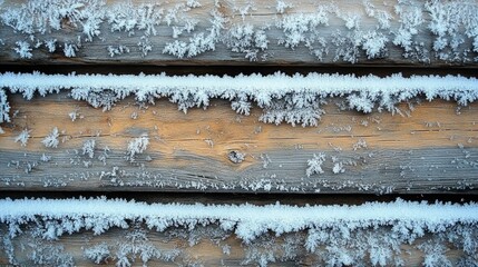 Close-up of snowflakes and frost on a surface, forming a lacy, textured pattern against the light. 467
