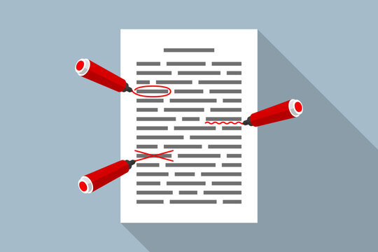 Document with red markings and markers, text checking and editing