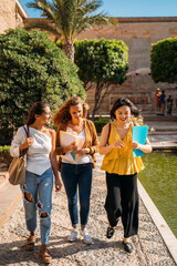 University exchange students walking and talking on campus