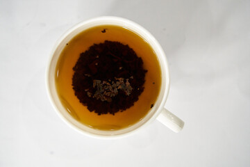 White cup of black tea