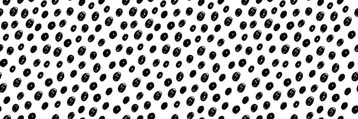 Small dash seamless pattern with polka dots. Hand drawn black circles on a white background create a playful, minimalist design. Perfect for fabric, packaging, and wallpapers. Vector illustration.