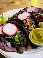 Blue corn tortilla tacos with fixings