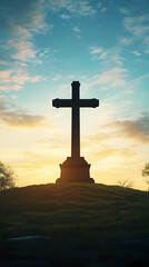 Stone Cross Stands on Hill at Sunset with Colorful Sky and Grassy Field