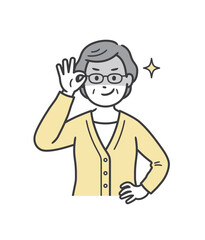 眼鏡を上げて悪巧みしてニヤける高齢女性
