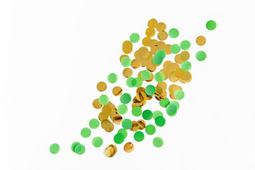 Festive background. gold and green confetti on a white background, flat lay.