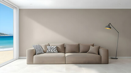 Modern living room features a comfortable sofa with stylish cushions and a sleek floor lamp, overlooking a serene beach view.