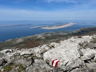 Naklejka premium View of the Adriatic Sea and islands from the Premuzic Trail - Northern Velebit National Park, Croatia (Pogled na Jadransko more i otoke sa planinarskog puta Premužićeva staza - NP Sjeverni Velebit)