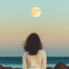 Obraz premium Serene Woman Watching Ocean Moonrise Peaceful Beach Scene