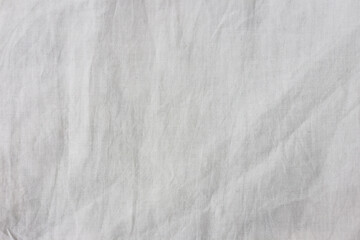 Close up white wrinkled fabric texture rippled surface, Soft focus.