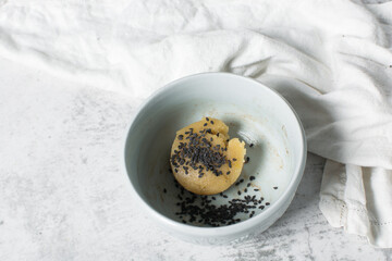 vanilla and black sesame sugar cookie dough, sesame coated sugar cookie dough about to be baked, process of making cookies