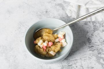 vanilla marshmallow cookie dough in a white mixing bowl, smores vanilla cookie dough about to be baked, process of making vanilla cookie dough
