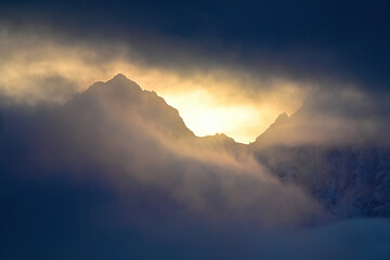 Cloudy sunrise in the Chugach Mountains in Alaska.
