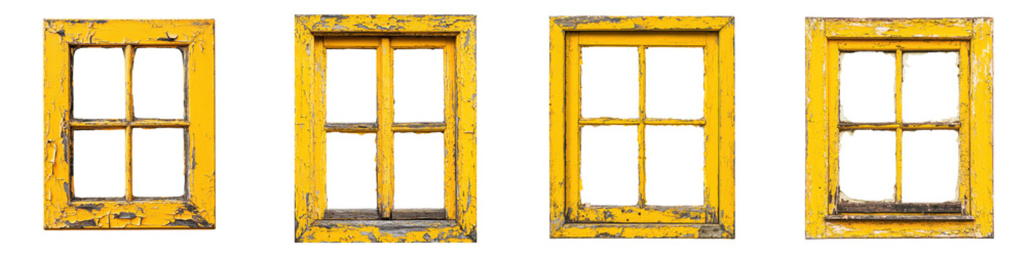 Closeup view of old weathered wooden window frames with distressed faded yellow paint in the exterior of an abandoned dilapidated building  The windows are in a state of disrepair