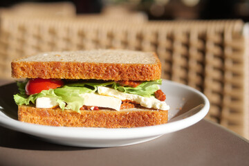 A Delicious and Wholesome Whole Grain Sandwich Filled with Fresh Vegetables