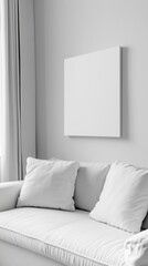 Blank photo frame mockup mounting on white wall with white sofa, Blank canvas frame in white living room with couch