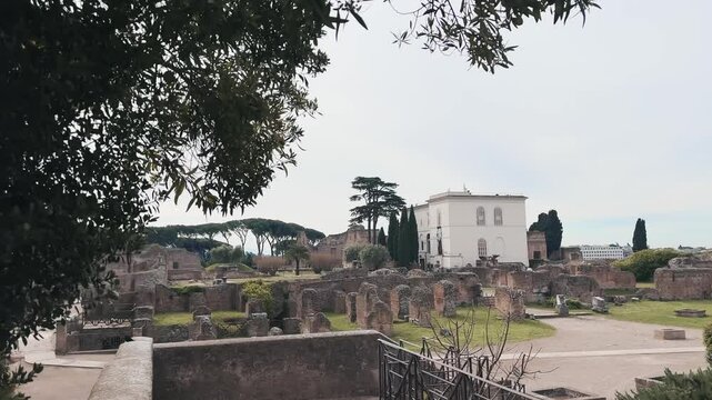 Panoramic establishing shot of museum Museo Palatino at Roman Forum in Rome, Italy with a ruins at background