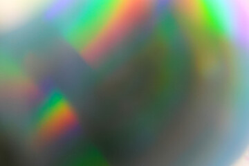 Abstract bright holographic background for design. Colorful rainbow image