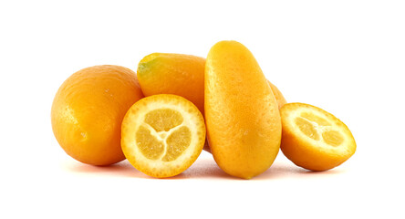 Fresh kumquats showing pulp and peel on white background