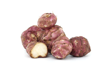 Fresh Jerusalem Artichokes Piled on a Clean White Surface