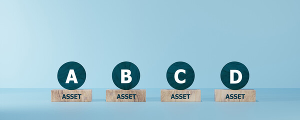 Assert A B C D words on wooden blocks. Investment asset allocation, diversification and risk management.  Real estate investment.