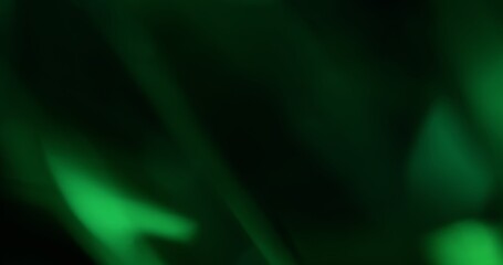 Bokeh green flickering. Changing shade color. Spectral overflows. Smooth fluctuation luminosity. Calm reflections different tone mystical background.