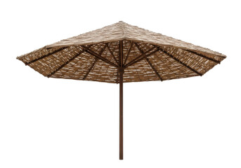 Obraz premium Traditional straw beach umbrella with a wooden pole, isolated on a white background