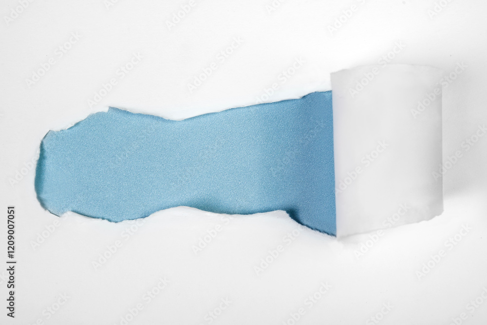 Aufkleber top view of white ripped paper with blue background. mockup. copy space. presentation or template. f