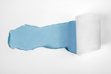 Top view of white ripped paper with blue background. Mockup. Copy space. Presentation or template. Flat lay