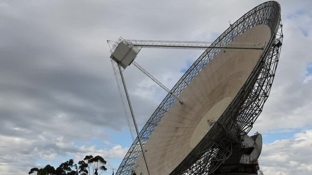 Radio Telescope in Motion Under Clouds