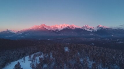 Majestic Sunrise over Snow-Capped Mountains