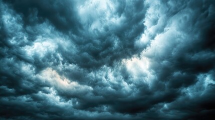 Obraz premium Dramatic Evening Rainclouds with Dark Textures Perfect for Abstract Wallpaper or Background in Stormy Weather Themes