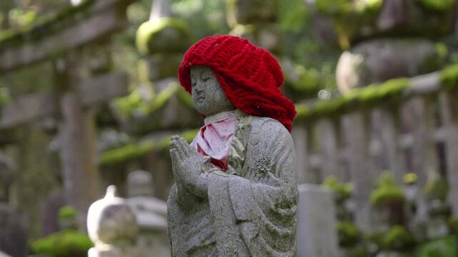 Close up of praying Jizo Buddhist statue in Japan
