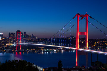 Obraz premium Istanbul Bosphorus Bridge at night. 15th July Martyrs Bridge (15 Temmuz Sehitler Koprusu). Istanbul, Turkey. 