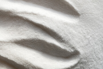 Pile of baking soda on white background