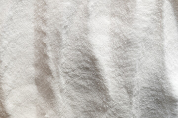Pile of baking soda on white background